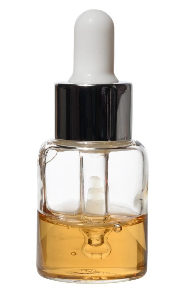 A small, clear glass dropper bottle containing a yellow or amber liquid, with a white dropper cap